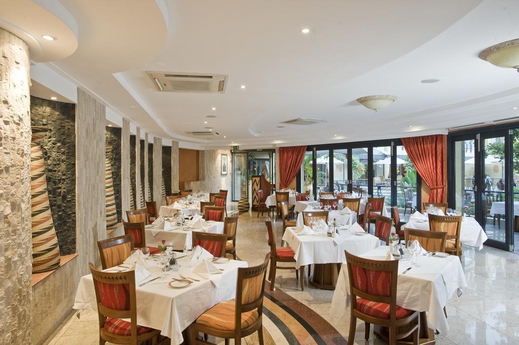 Kigali Serena Hotel Экстерьер фото